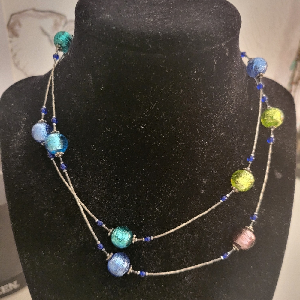 Italian murano glass beads silver necklace purchased in Murano glass shop.